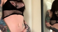 Tattood shemale tranny plays with ass during masturbation