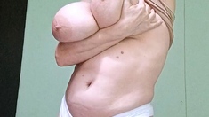 Big ass babe exposes her big boobs