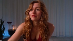 Amateur redhead Jacqueline with glasses masturbates