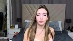 Sexy Brunette Babe Spreads Legs And Masturbates Shaven Twat