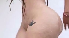 Busty curly brunette with big boobs fucks on couch